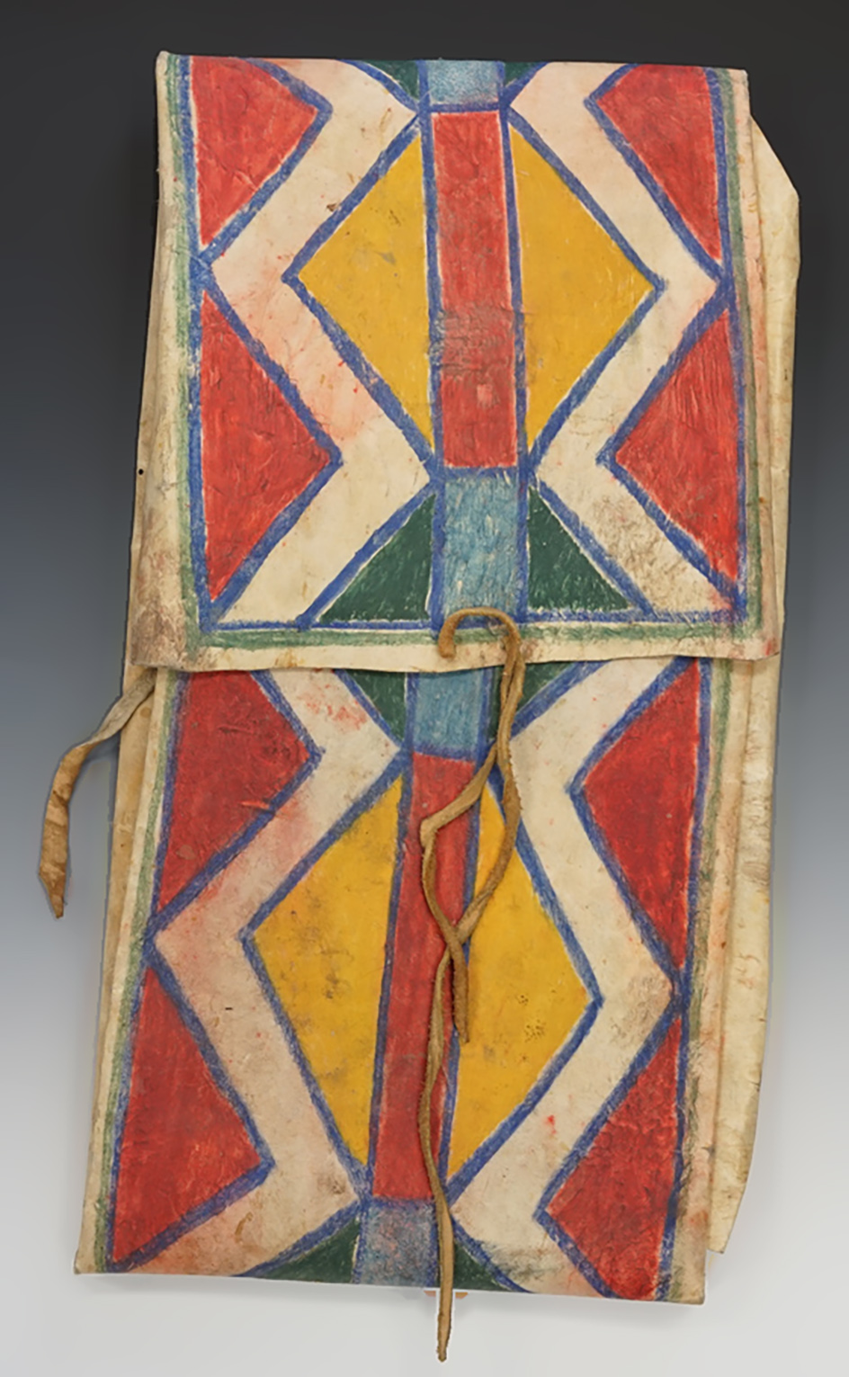 Very large 24" x 13" Parfleche bag made from leather with original paint in nice condition.