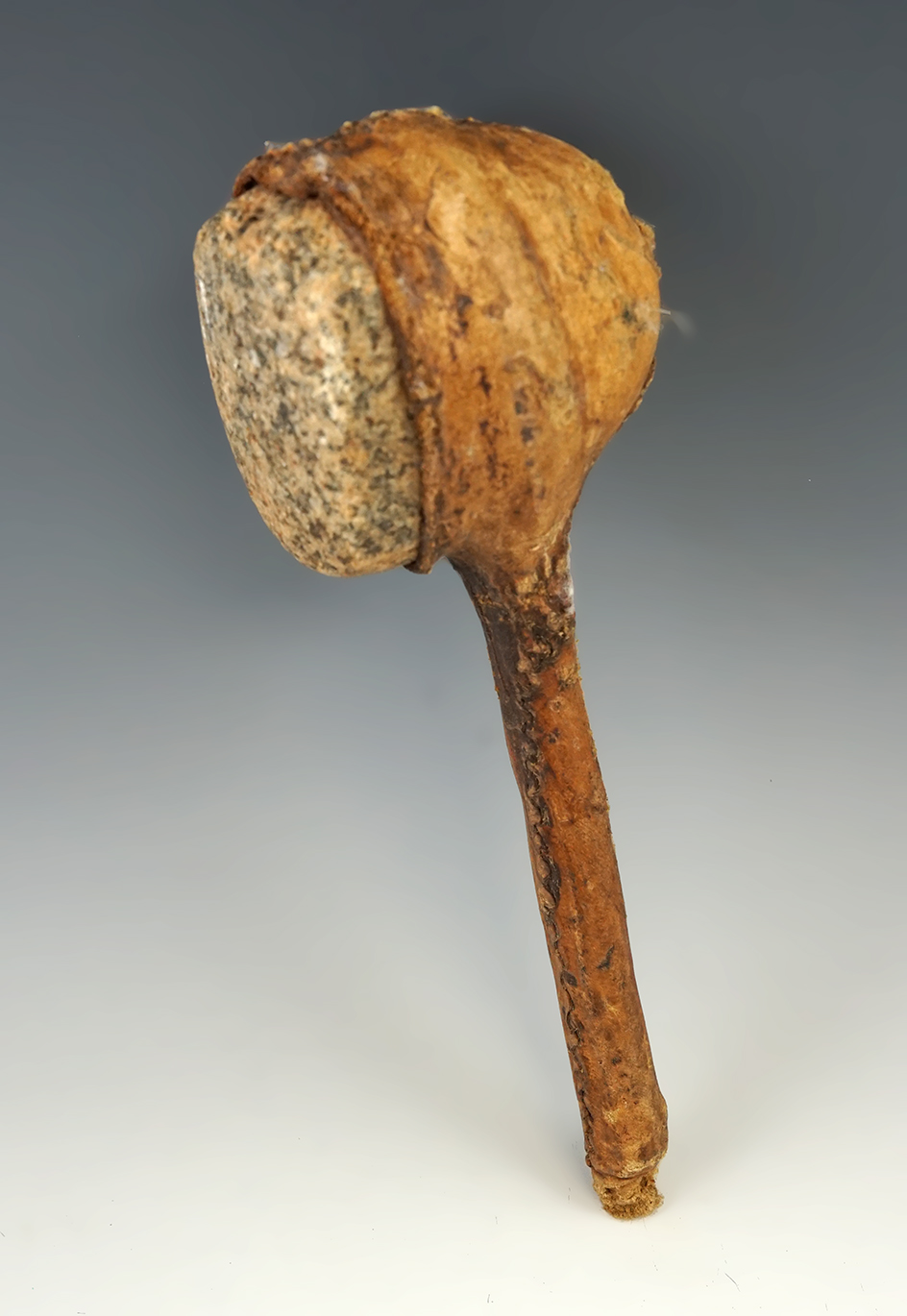 Leather wrapped granite stone hammer with Sinew stitching. 9" length. Ex. Dale Jones.