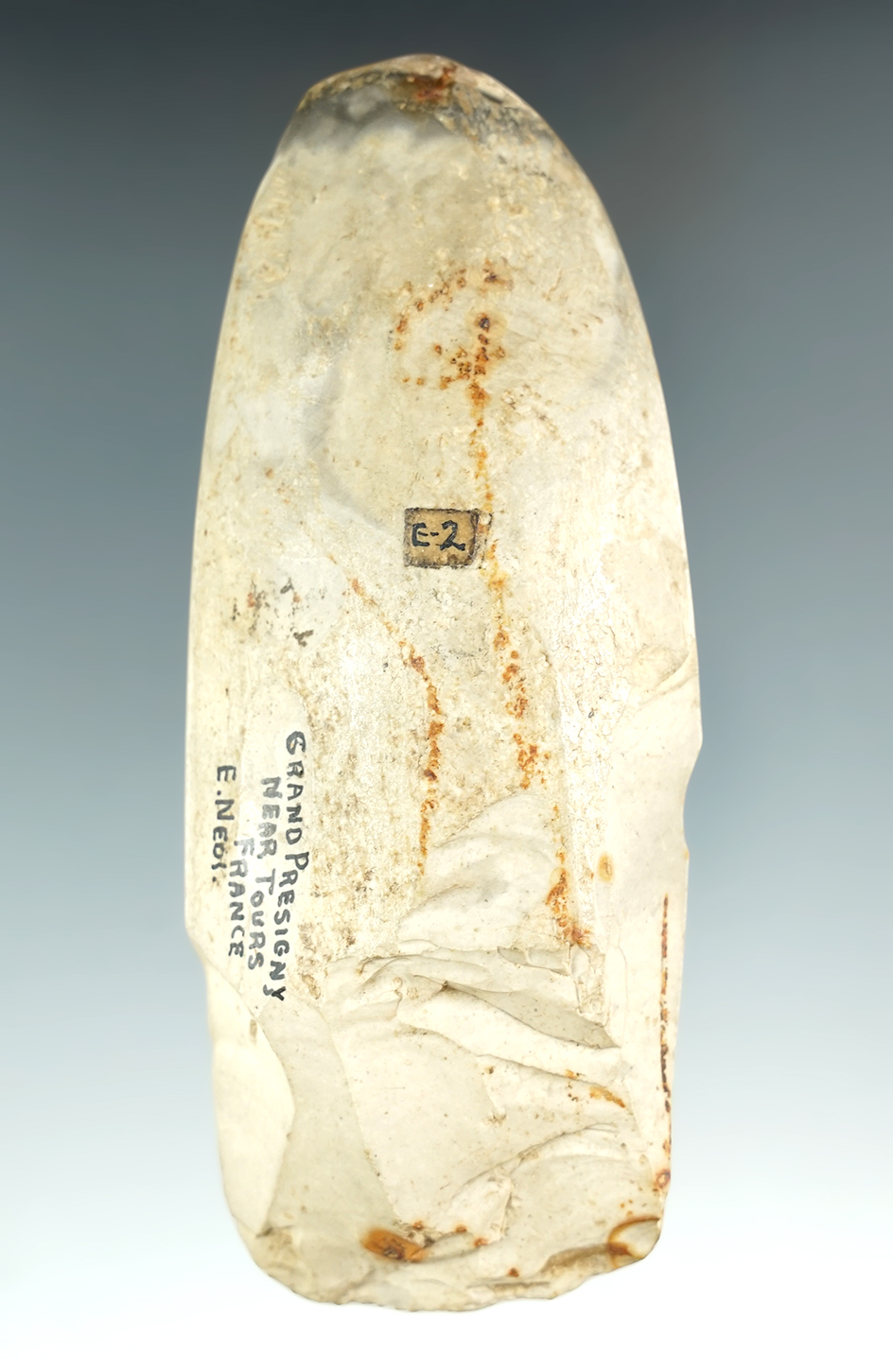 Polished Flint 5" long Neolithic chopping tool from France. Some ancient use damage to bit.