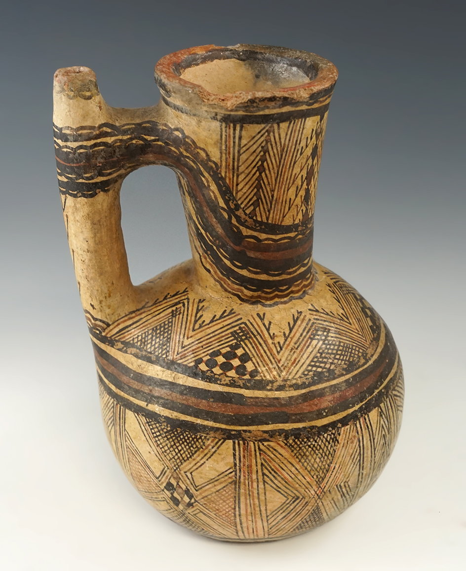 9 1/2" tall handled Berber pottery vessel from Morocco.
