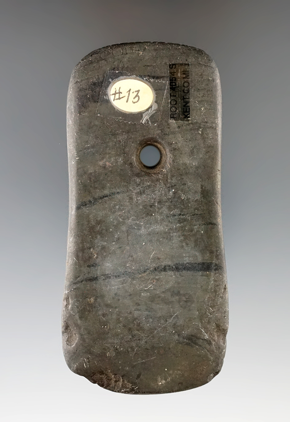 4 1/8" Tallied Adena Indented Pendant found in Kent Co., Michigan. Ex. Cameron Parks Collection.
