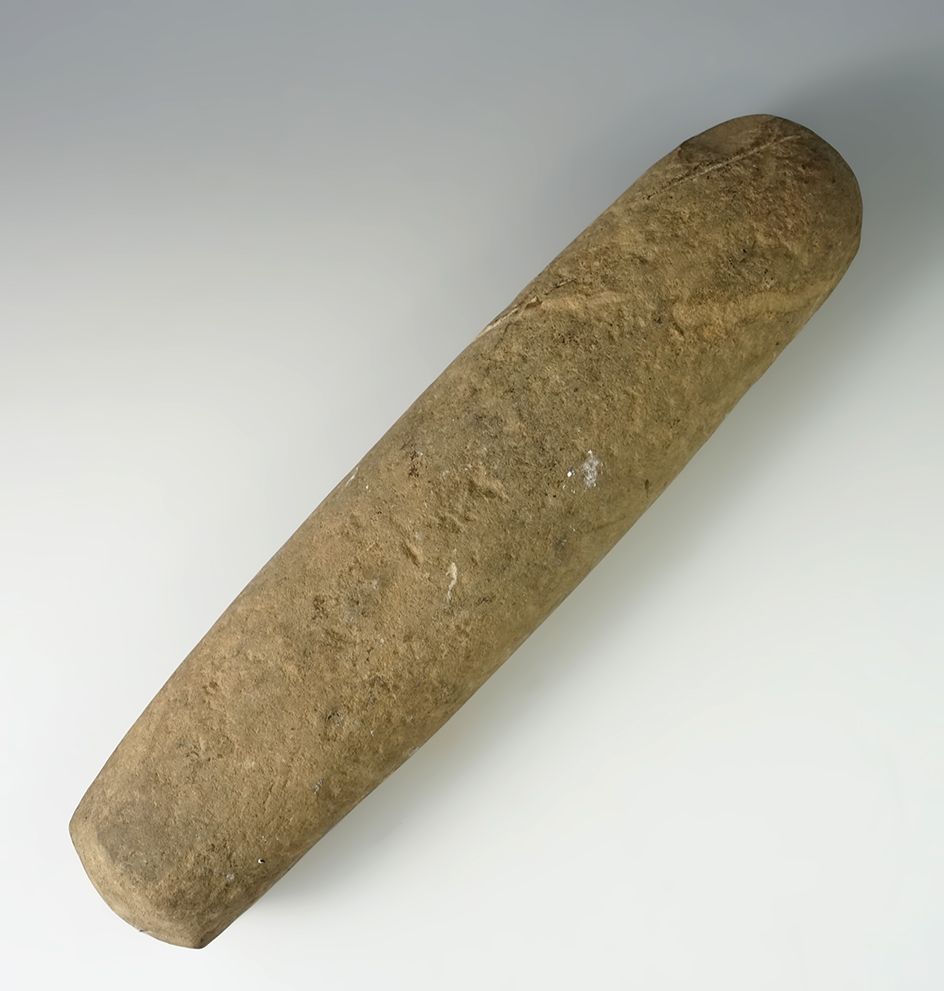 10 7/8" roller pestle found in New York.