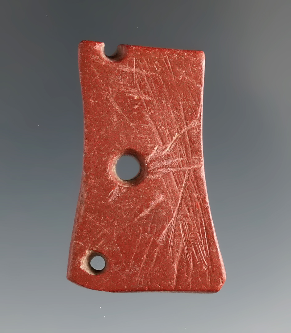 1 9/16" Catlinite pendant that has been anciently salvaged found in Illinois. Ex. Fred Coleman.