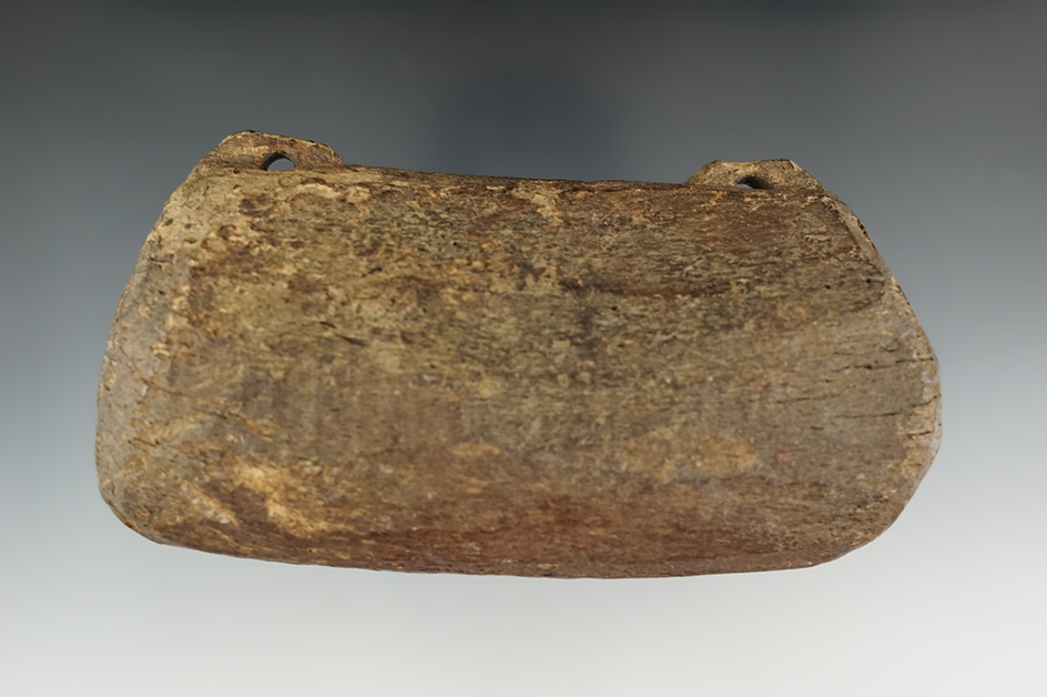 4 3/16" drilled Inuit whale bone fishing weight recovered in Alaska.