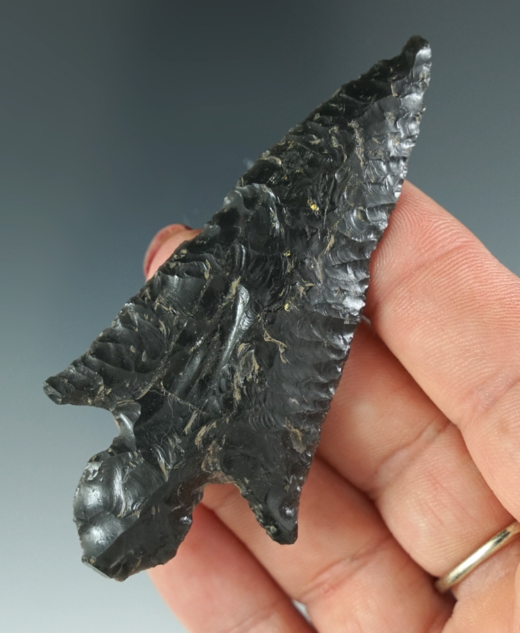 Excellent style on this 3 1/16" Pre-Columbian Obsidian point with beautiful diagonal flaking.