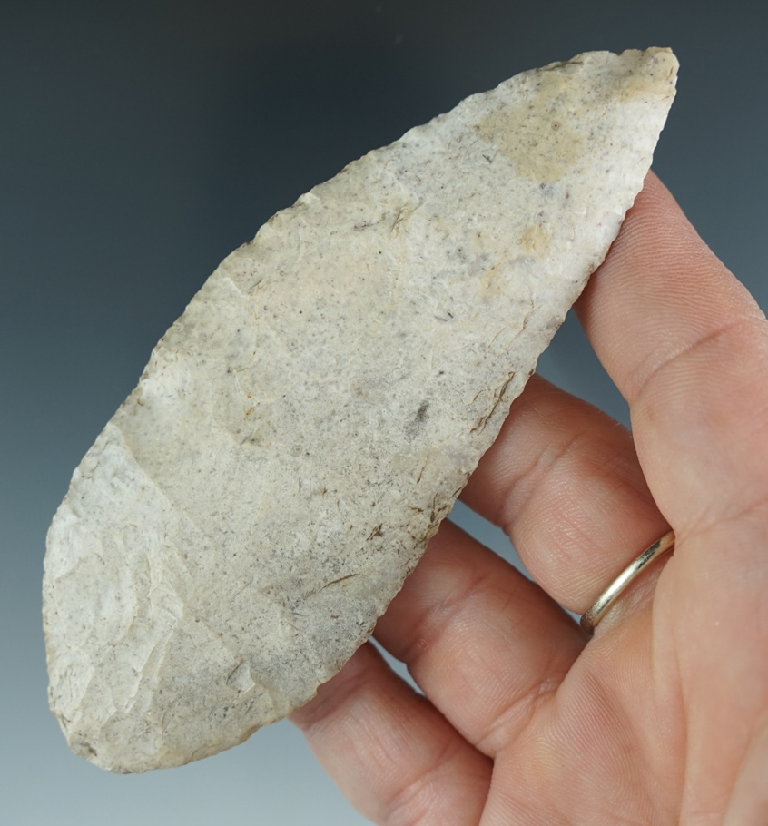 4 1/8" well flaked and heavily patinated Flint blade found in Henry Co., Missouri, in 1940.