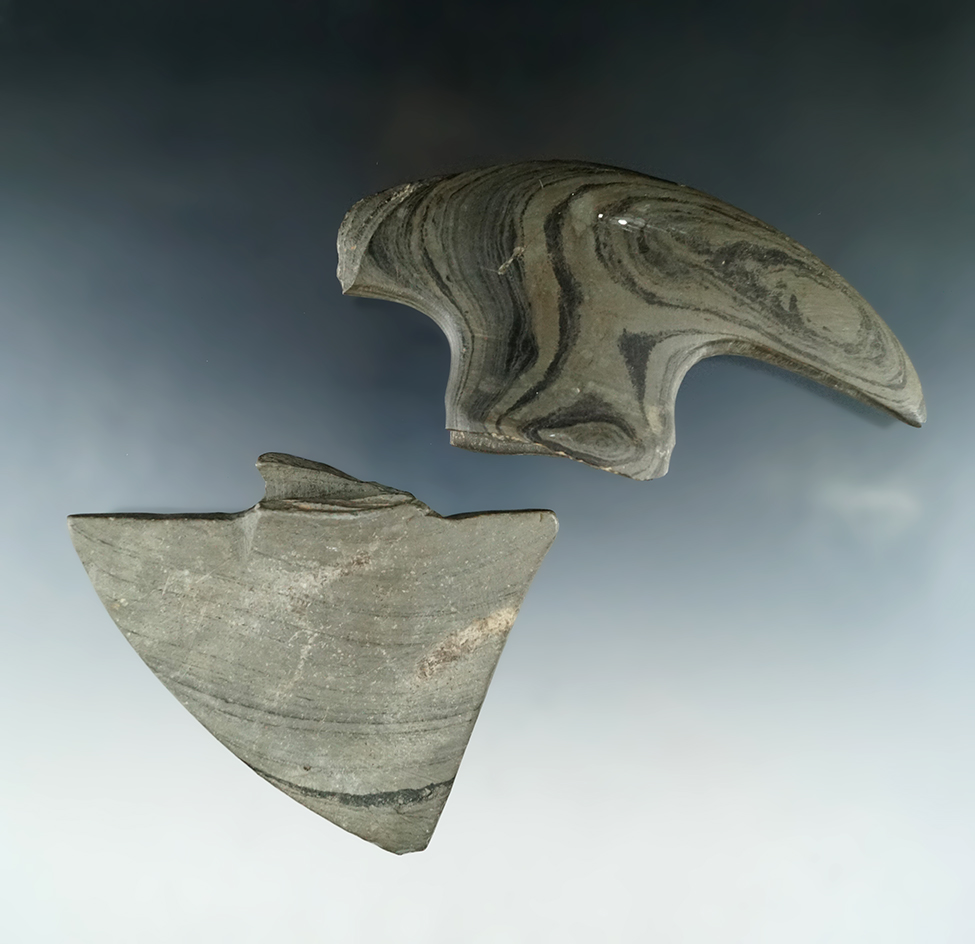 Pair of Bannerstone halves which broke at the barrel, largest is 4 7/8" wide.