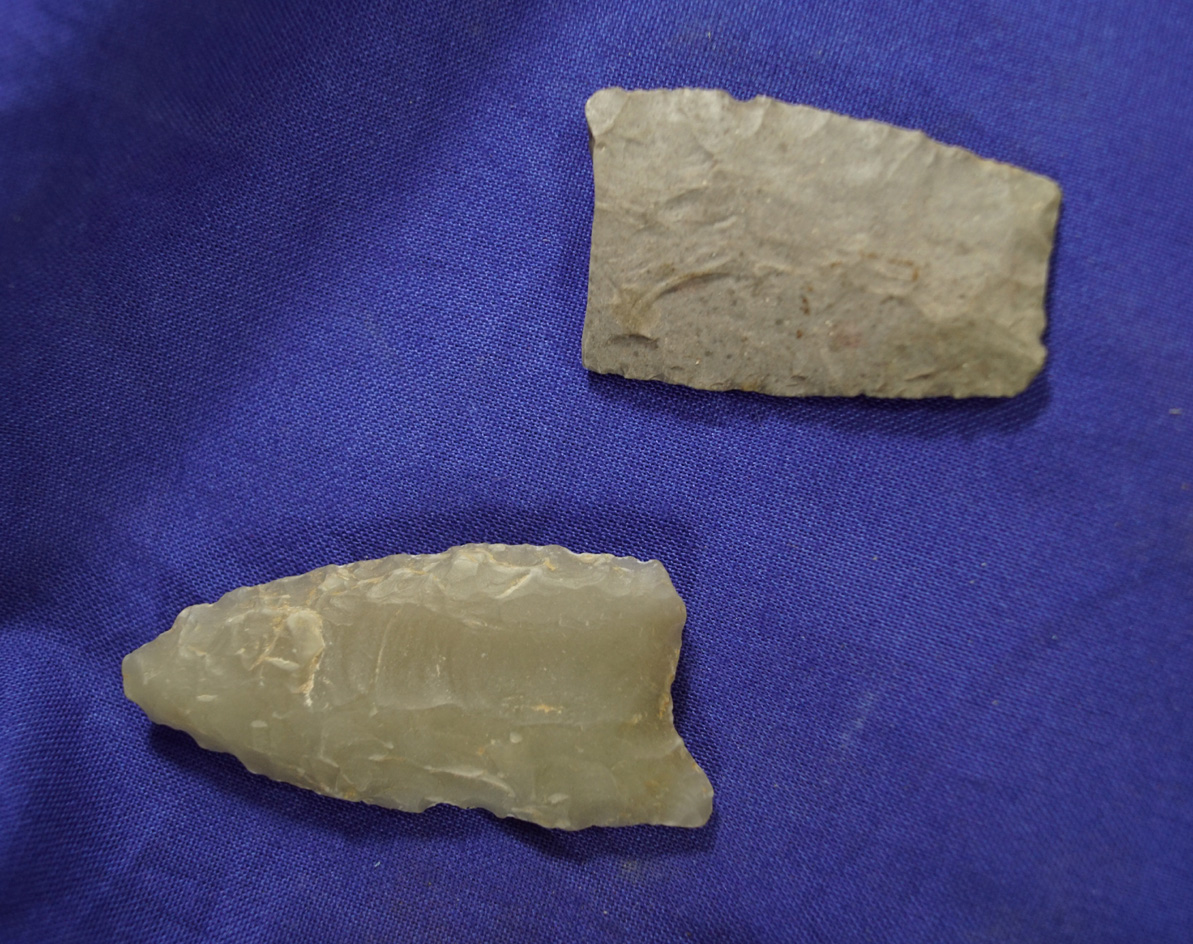 Pair of Paleo artifacts including a 2 1/4" Novaculite Fluted Clovis & 1 11/16" Paleo Lanceolate Base