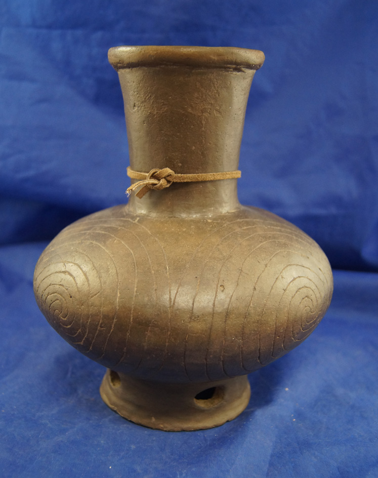 8" Tall Pedestal Bottle with some restoration, pictured in Who's Who #9, page 89.