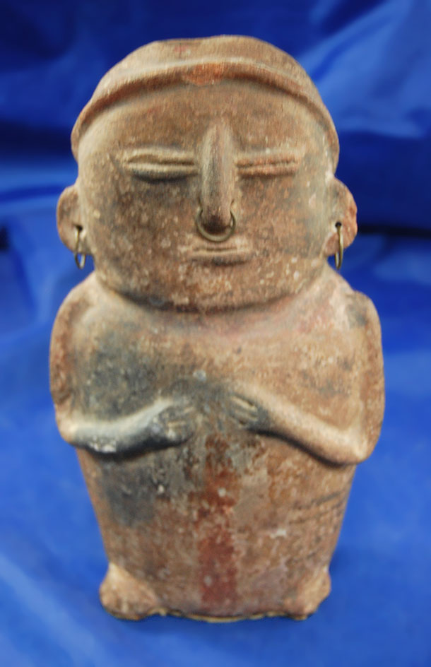 8 1/4" tall PreColumbian clay figure with ear and nose adornments found in Columbia, South America