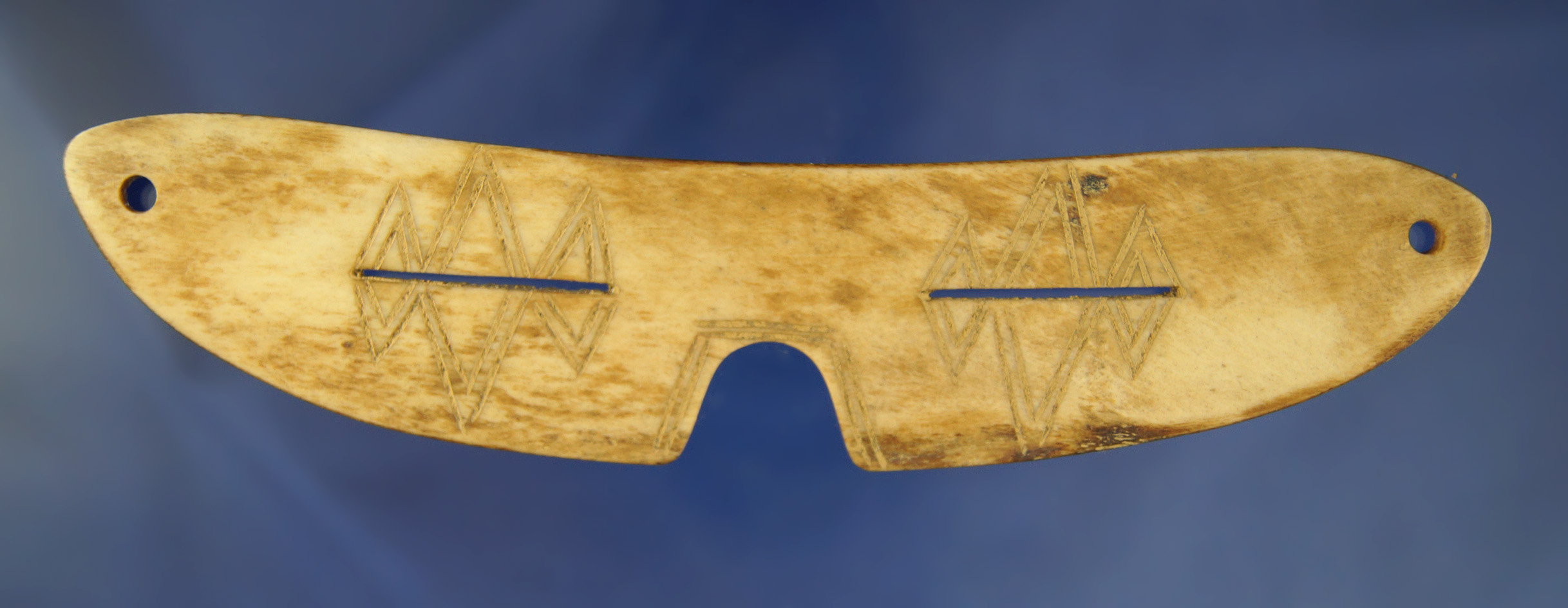 6 3/8" Inuit Snow Goggles from Alaska. Pictured in Hothem's antler bone and Shell book on page 81.