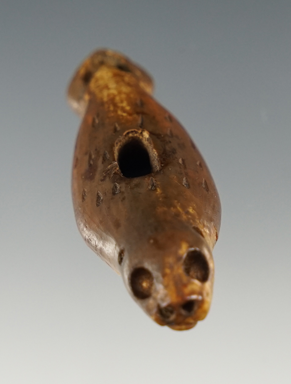 Beautifully carved 2 7/16" Eskimo Adornment of a seal. Well patinated. Found in Alaska.