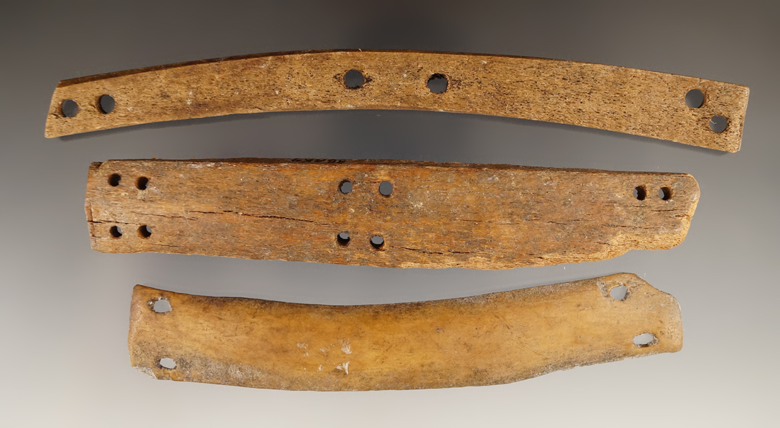 Set of three sections of Inuit bone armor found in Alaska, largest is 6 3/4".