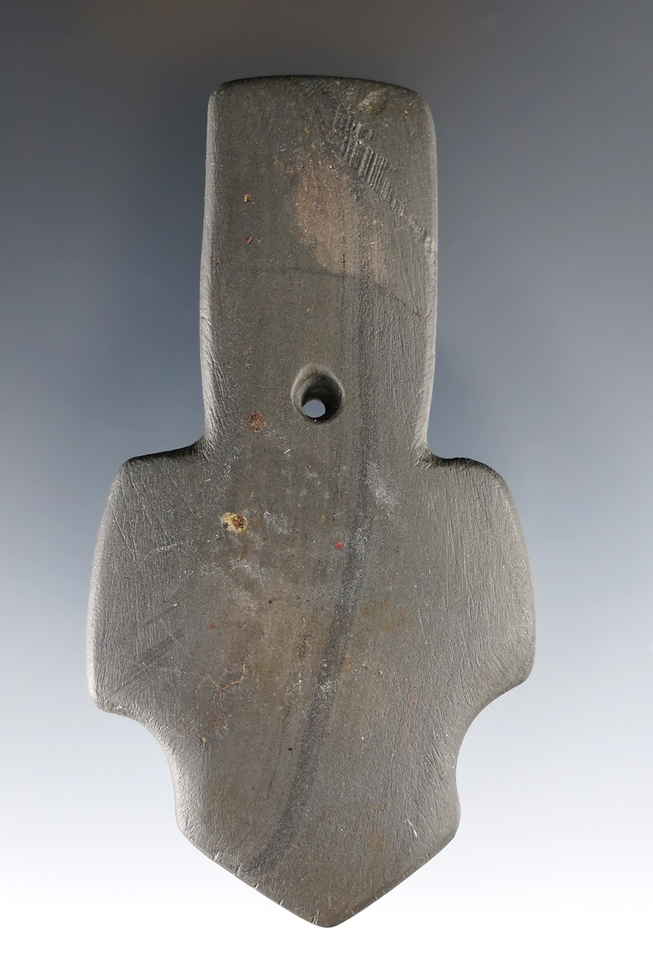 3 9/16" uniquely styled shovel pendant made of banded slate. Found in Knox Co., Ohio.