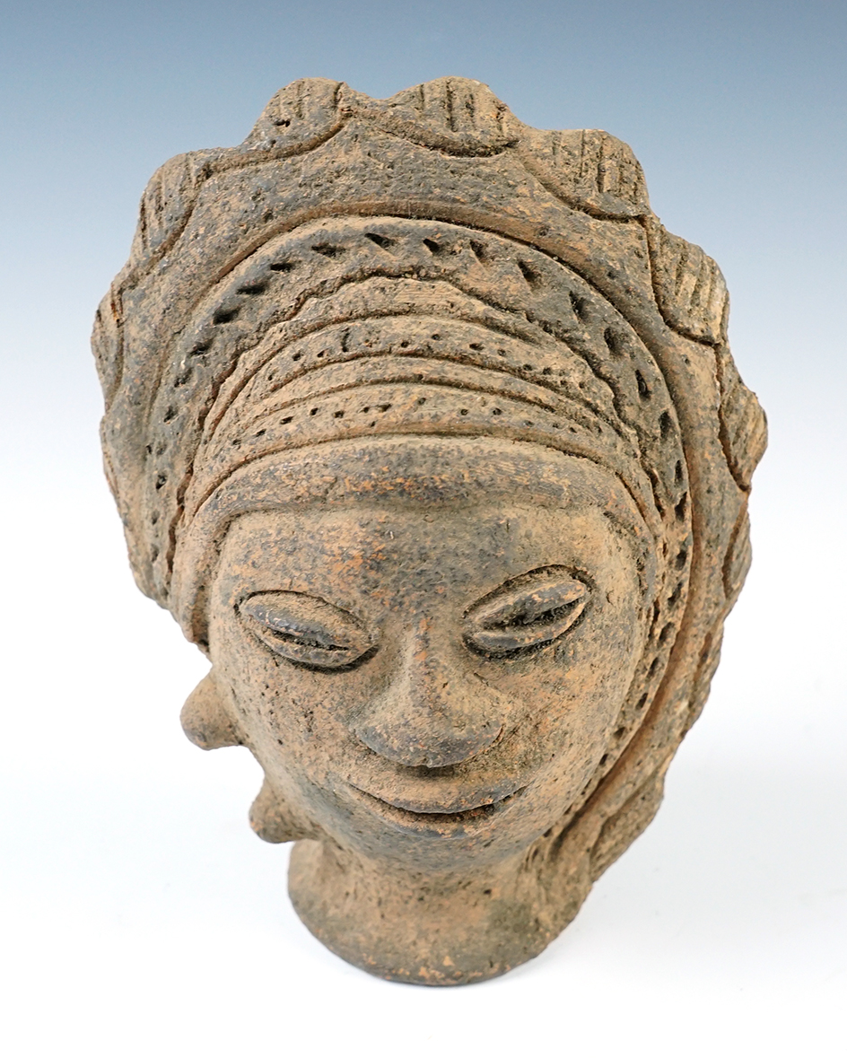 Large 6" tall Asian pottery head that makes a great display.