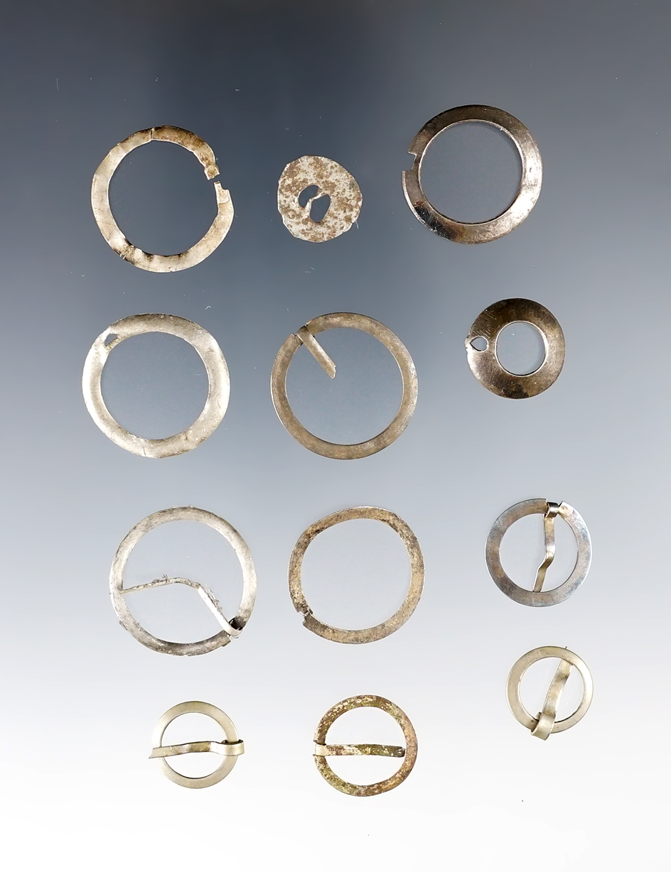 Set of 12 Trade Silver Broaches found by John Grotte in Minnesota & Wisconsin. Ex. Lewis.