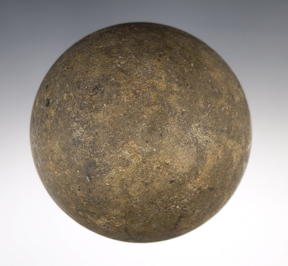 2 3/4" diameter well polished and nicely patinated stone game ball. Found in Ohio.