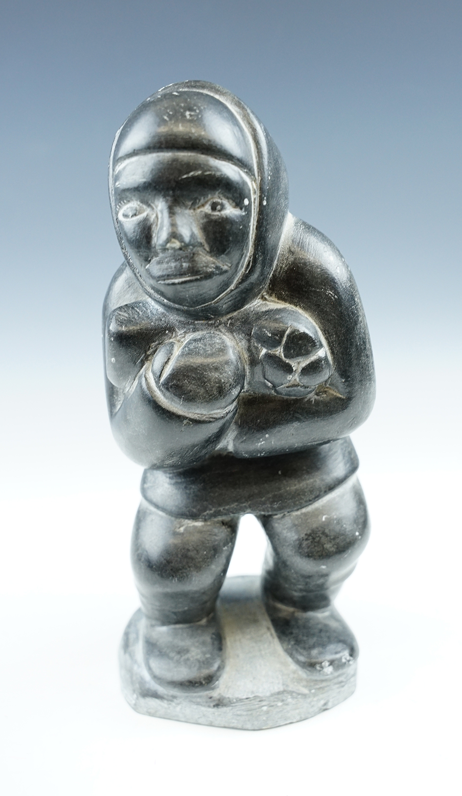 Large 9 1/4" tall Eskimo Art Canada stone statue made by Adamie Putuguk from Povungnituk.