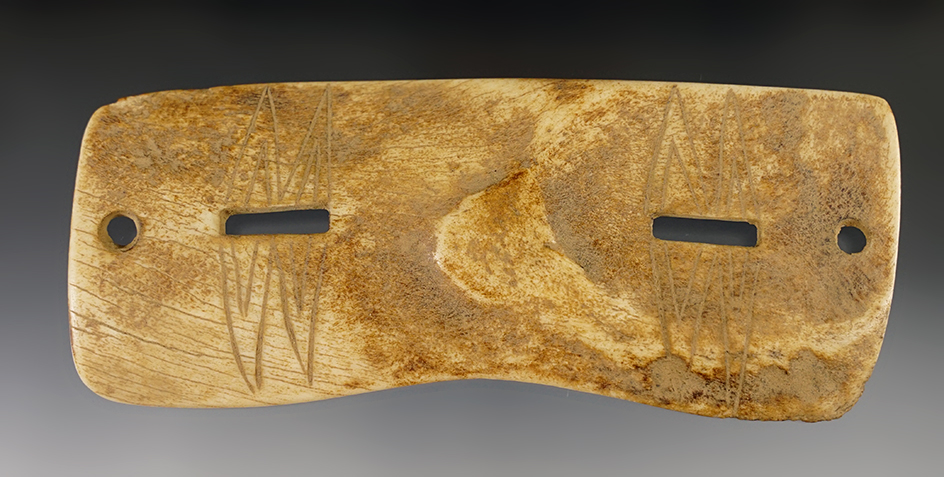 5 7/8" Inuit bone snow goggles recovered in Alaska.