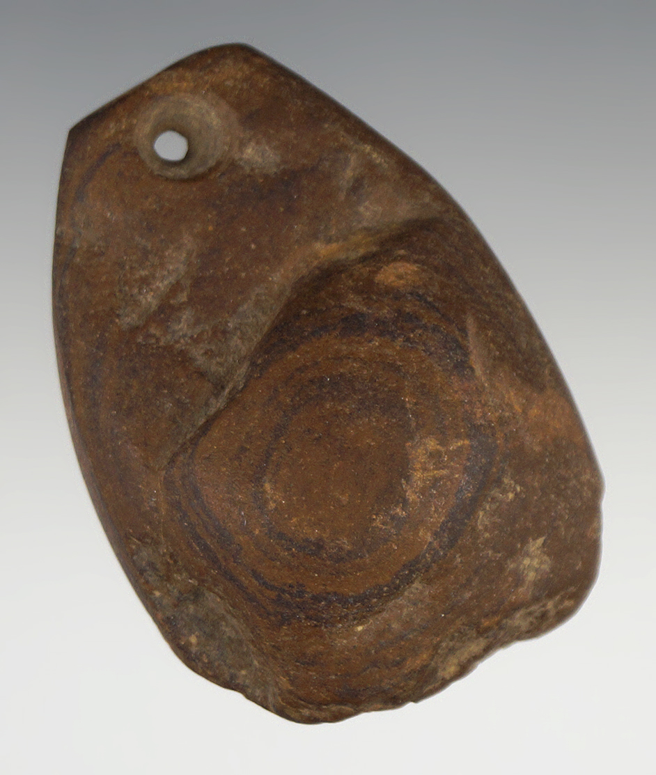 2 3/16" Uniquely styled drilled clay stone Plummet found at Poverty Point, Louisiana.