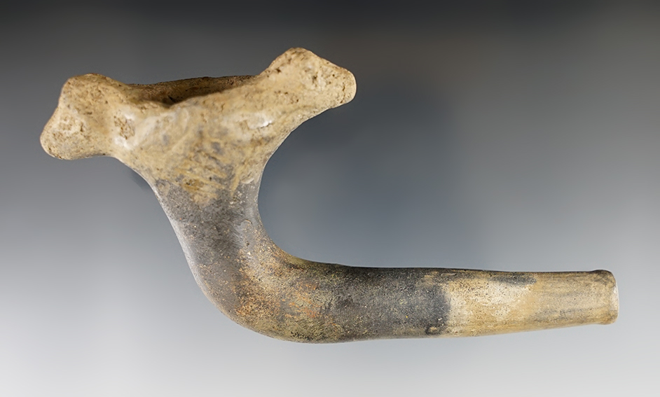 Rare style! 5 3/8" long Iroquois clay pipe with a double animal head effigy at bowl. New York.