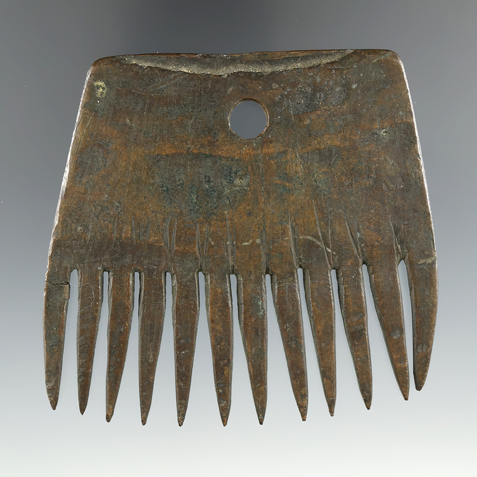 3 5/16" historic period copper comb which was salvaged by natives from a larger copper object.