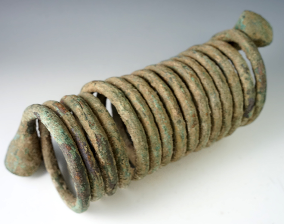 Large and heavy 9" long mixed metal coil money from Africa.