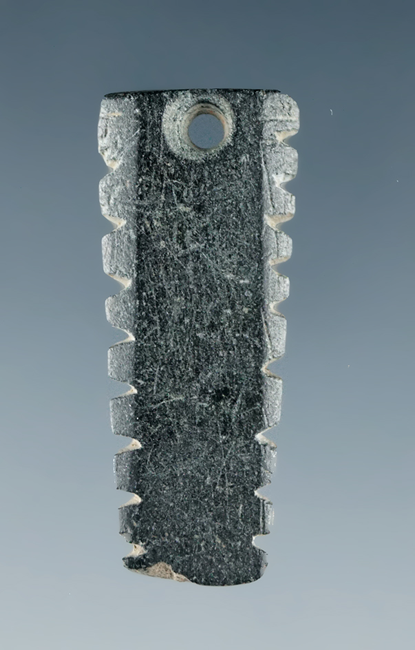 Nicely carved and drilled 1" stone bangle/pendant that is thin and smooth. Drilled for suspension.