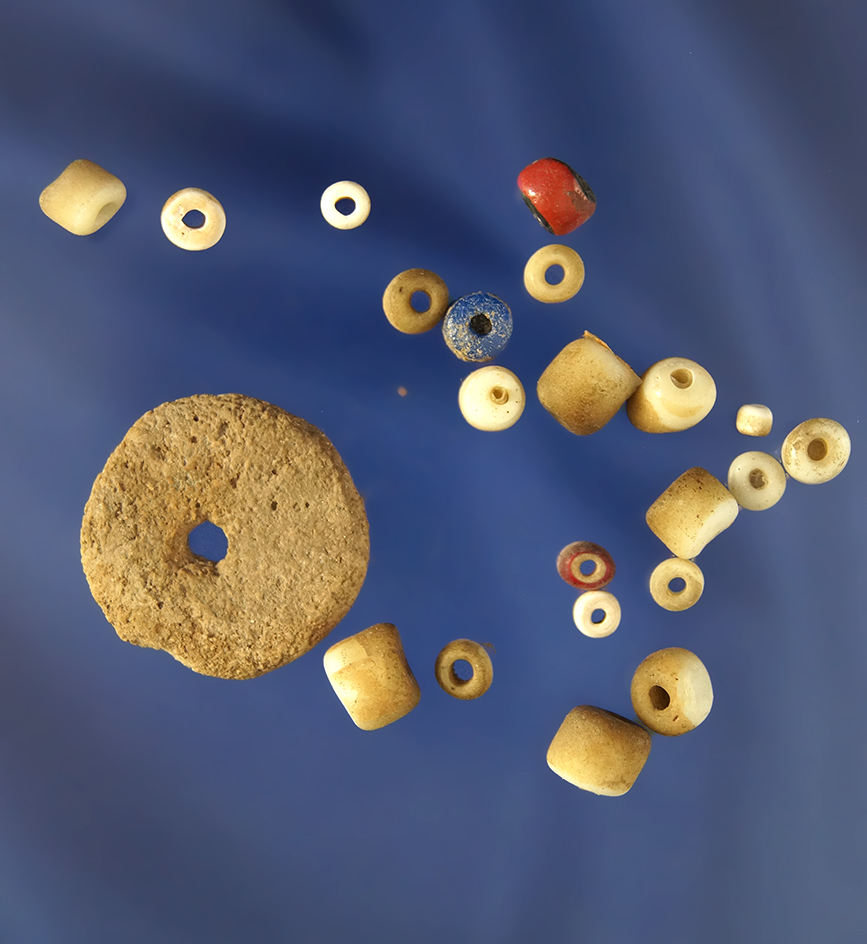 Group of assorted drilled stone beads and trade beads from the High Plains area