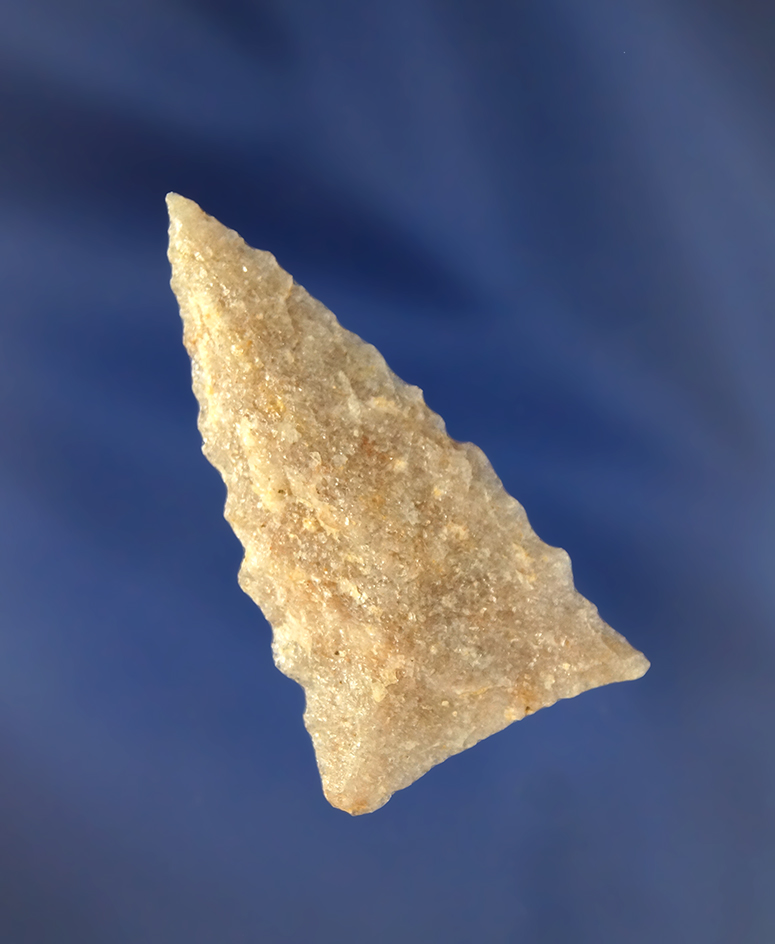 Nicely serrated 2" Quartz Arrowhead found in Virginia.