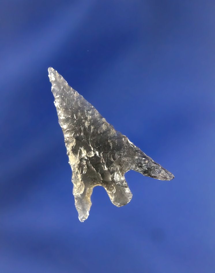 1 3/16" Columbia Plateau that is nicely flaked from Obsidian with one restored ear. Found in Oregon.