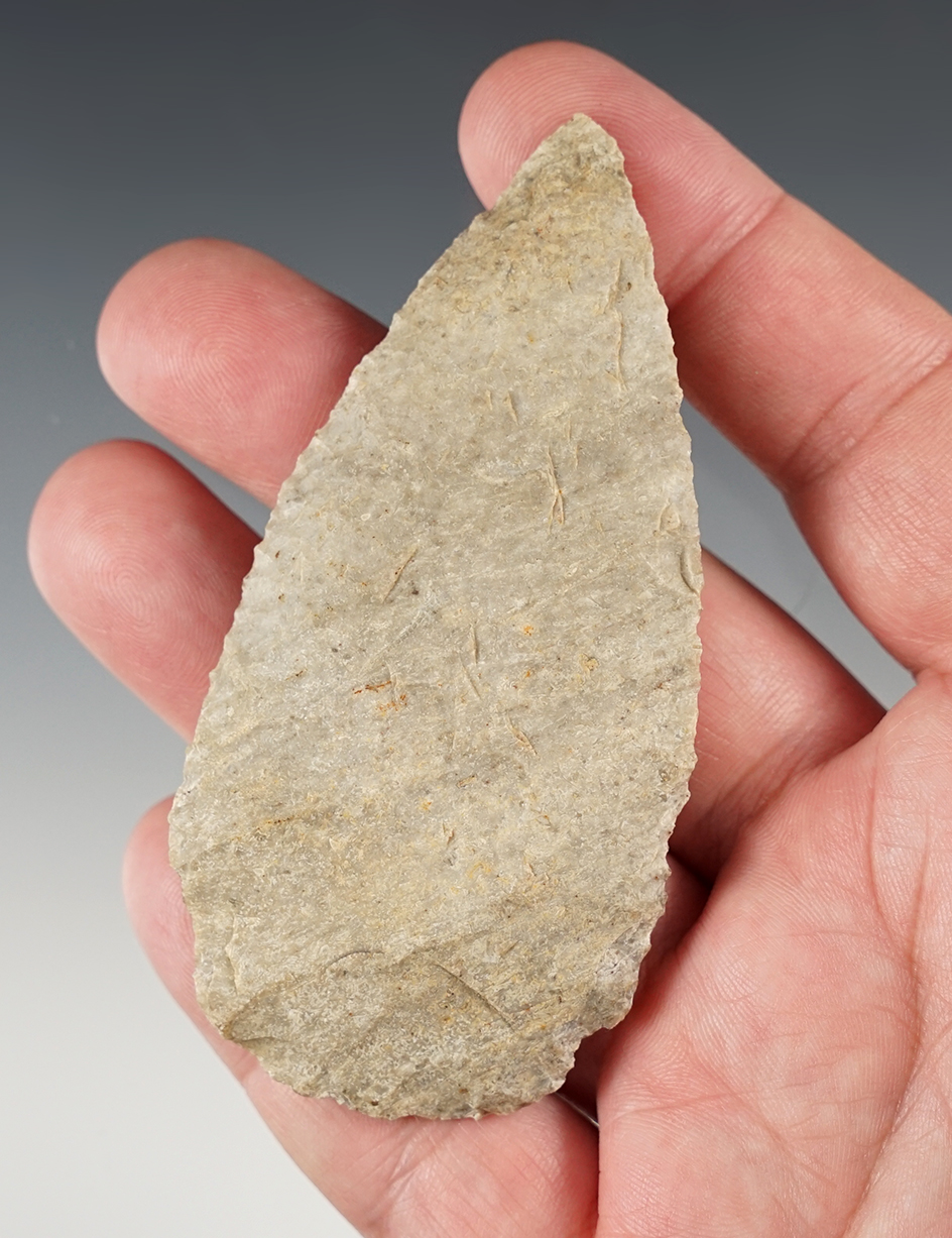 3 9/16" Archaic Blade made from patinated Harrodsburg Chert. Found in Monroe Co., Indiana.