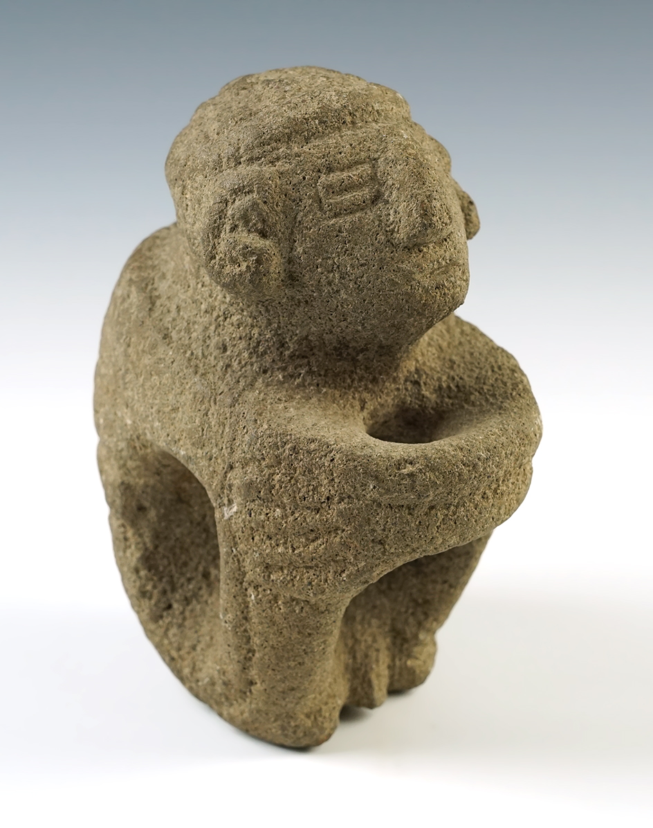 6 1/4" Tall Carved Stone Seated Human Effigy. Exact age and culture unknown.  