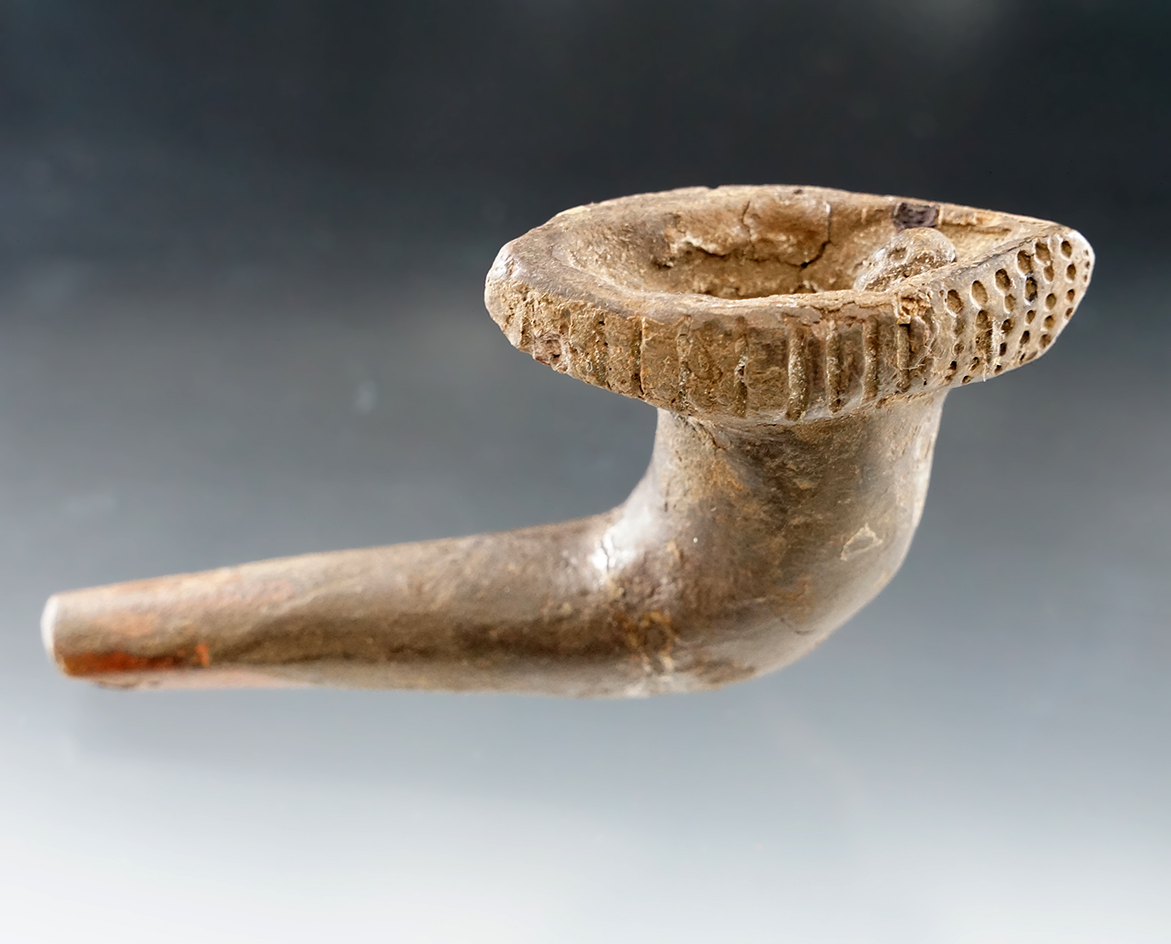 4 3/4" Unique Iroquois clay canoe effigy pipe that is broken & mended at the elbow - some restoratio