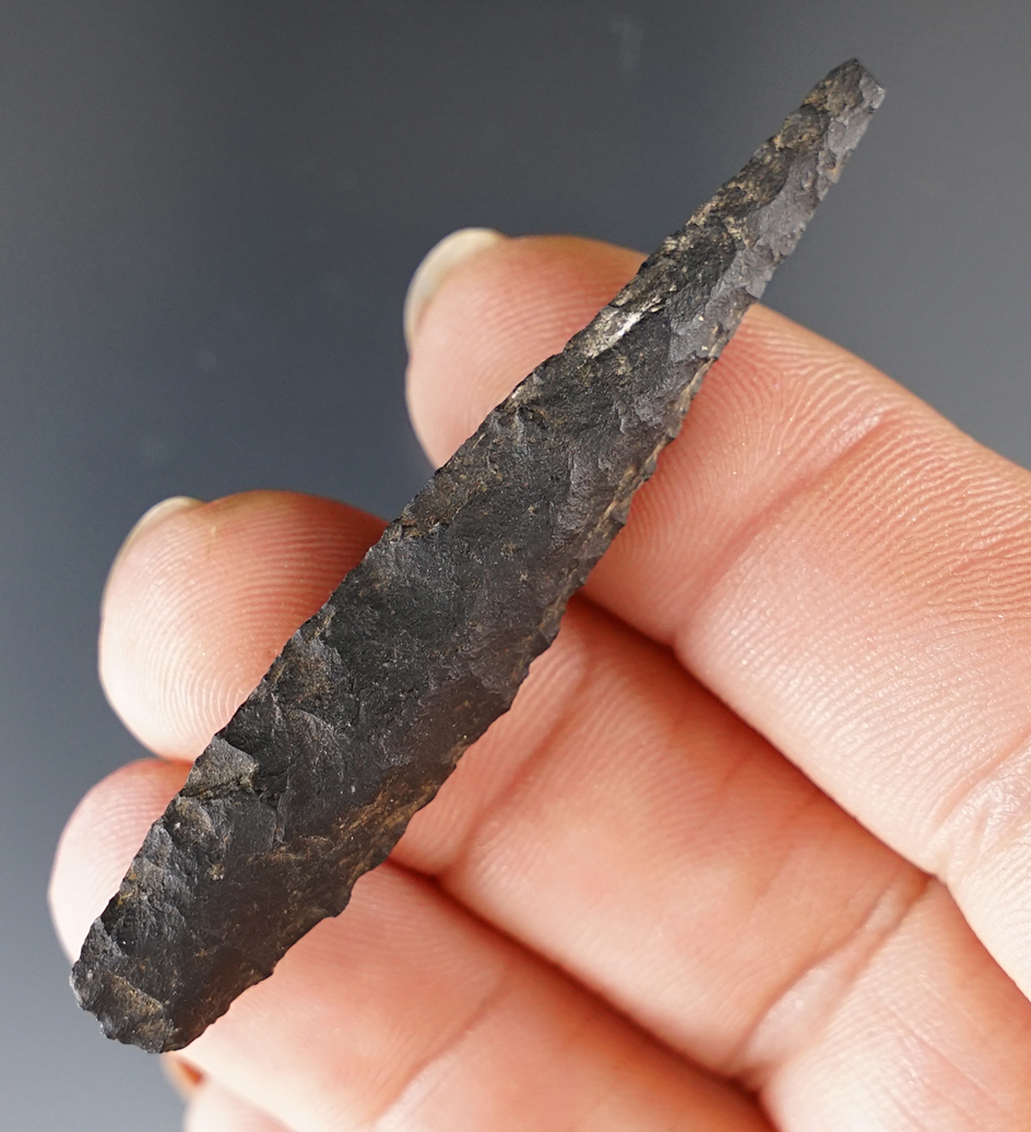 2 1/4" Inuit point found in Alaska and made from nicely patinated flint.