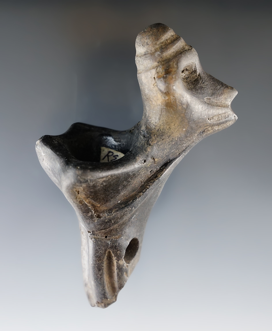 4 1/4" tall Iroquois clay pinched faced blower pipe with some restoration to the reattached effigy