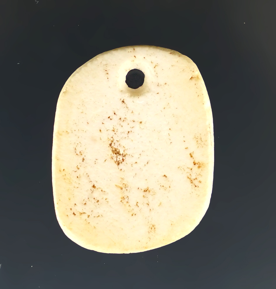 1" well styled drilled stone pendant found in Rio Puerco Valley, New Mexico.