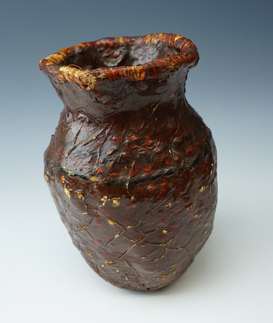 Early Apache 6 1/4" Pitch covered basket found in Arizona.