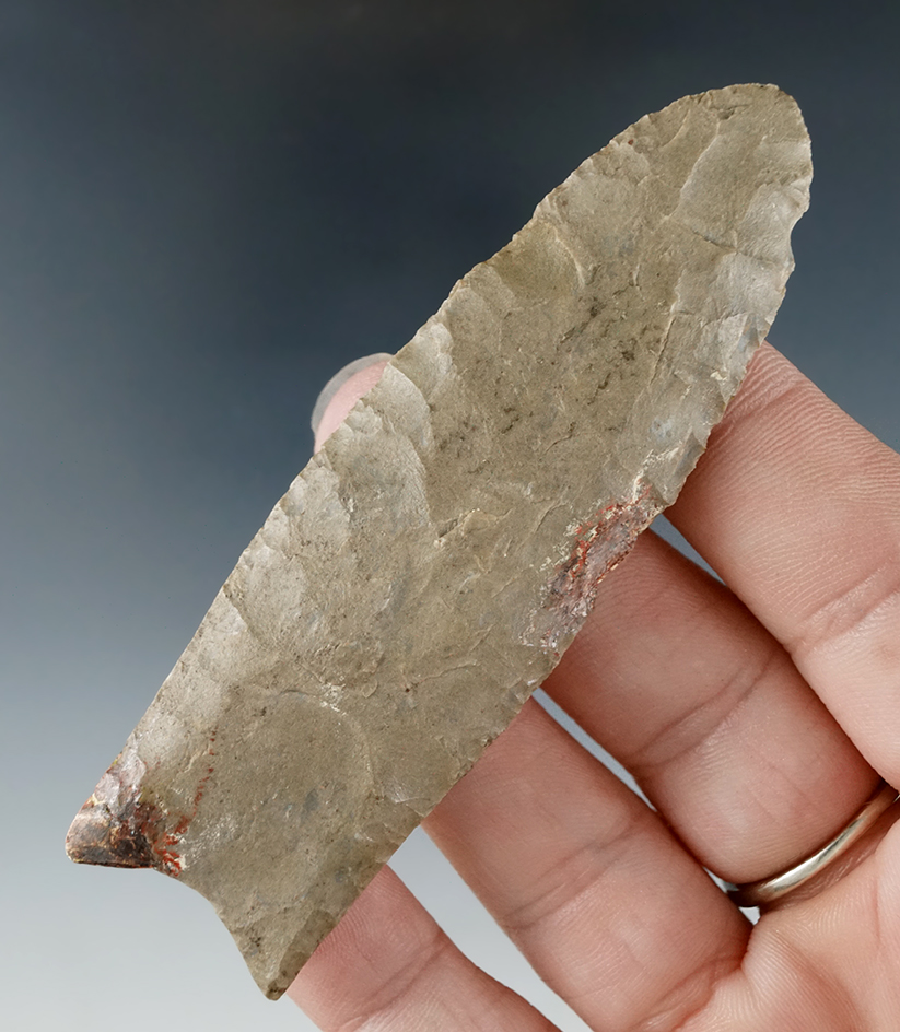 3 7/16" Paleo fluted Clovis with two small spots of old restoration which should be redone. Found at