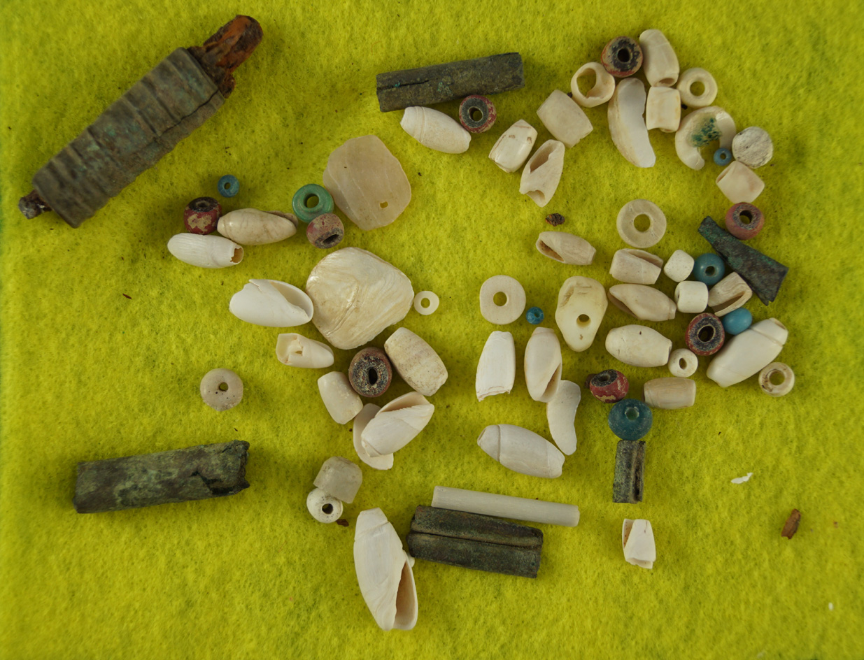 Group of assorted trade, copper and Shell beads found on an Arikara village site- South Dakota.