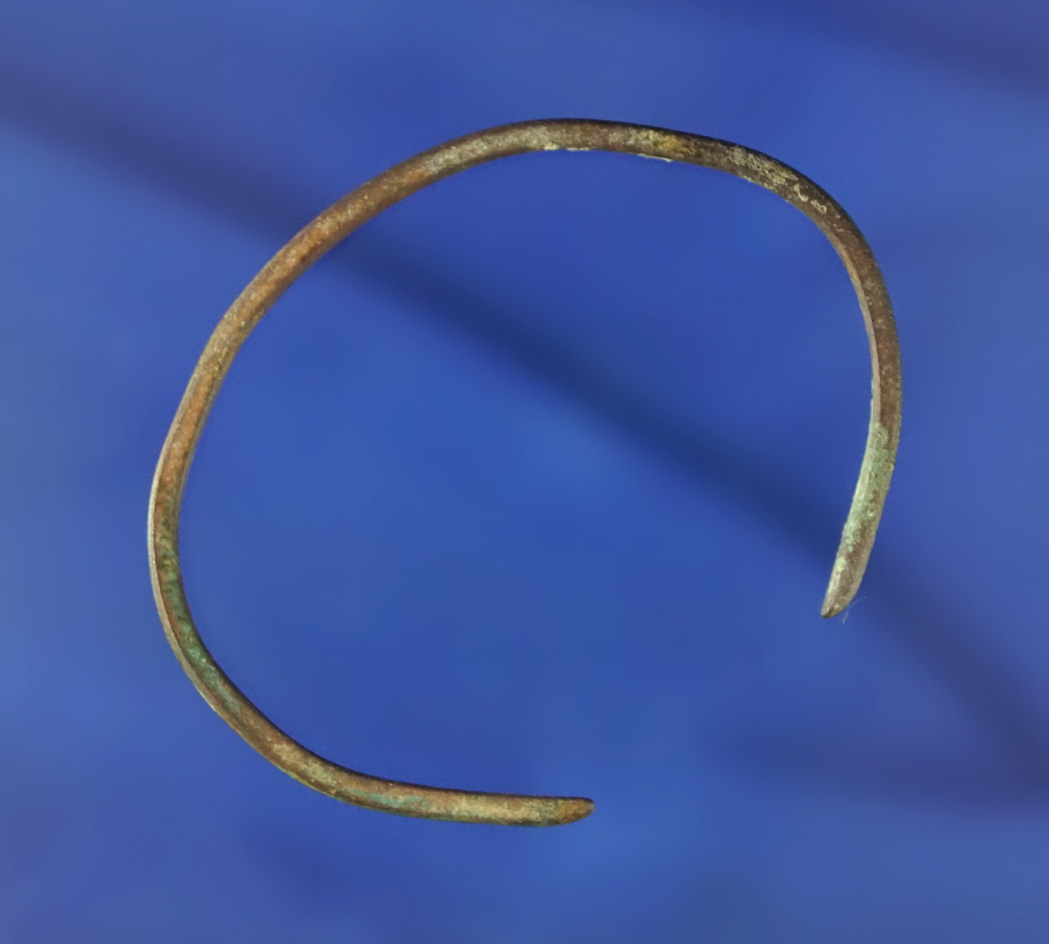 1 15/16" child's bracelet made from copper found on an Arikara site on Missouri River in SD.