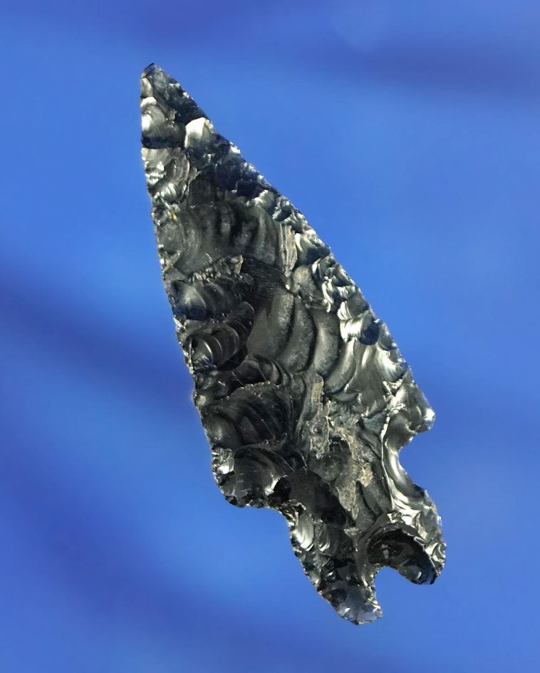 1 9/16" obsidian Pinto Basin that is very nicely flaked and well styled found in Nevada.