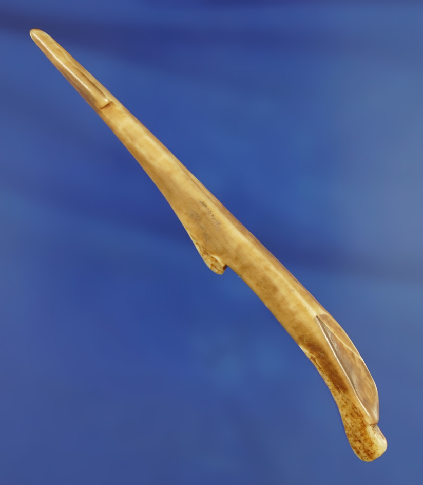 3 7/8" Bone Harpoon tip that is very old and wave polished found in Alaska.