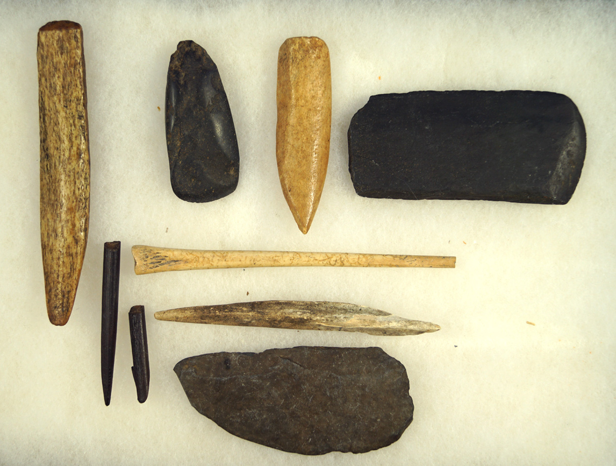 Nice set of bone and stone artifacts found in Alaska. Largest is 4 3/16". Includes a slate Ulu Knife
