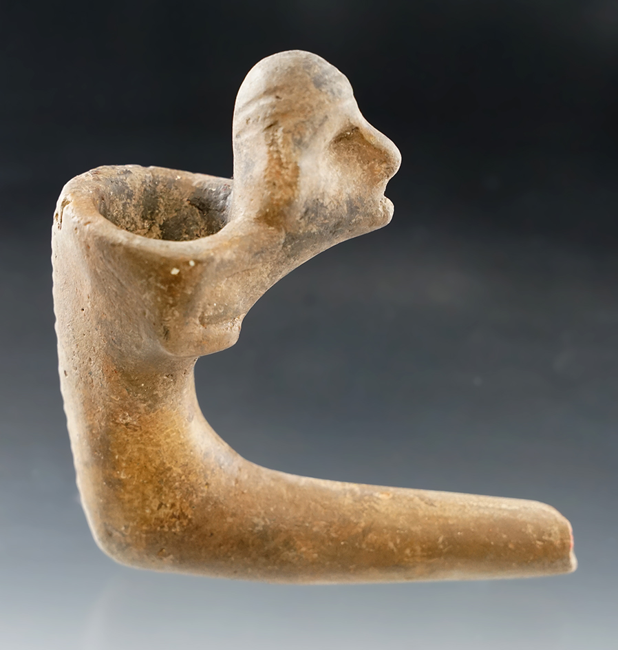 3 1/2" Long Huronian Clay Pinched Face Pipe with restoration to the bowl and stem. New York.