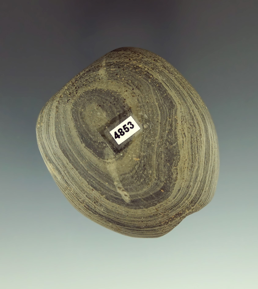 2" Flattened Ball Bannerstone that is slightly fluted found in Indiana.