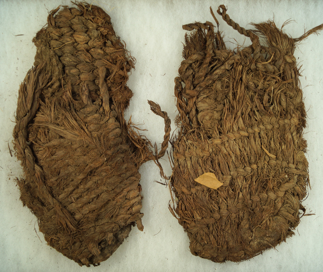 Pair of sandals made from plant fiber cordage, largest is 10 3/4" deaccessioned from a museum.