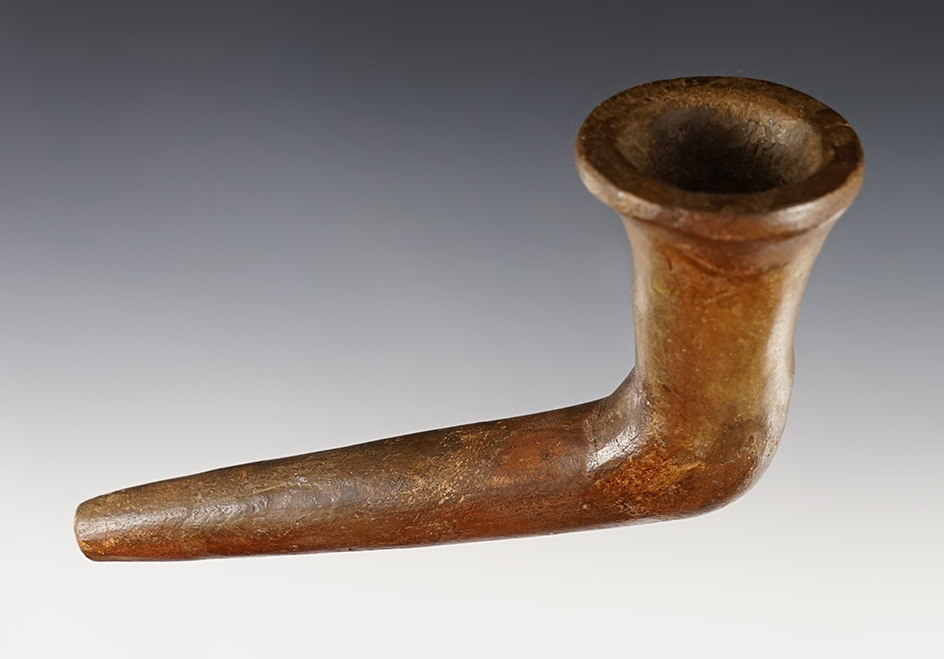 6" long Iroquois clay pipe that is heavily restored found at the Noley Site in Belleville, New York.