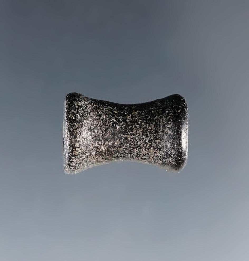 3/4" facial ornament made from nicely polished stone. Sacramento Valley, California. 