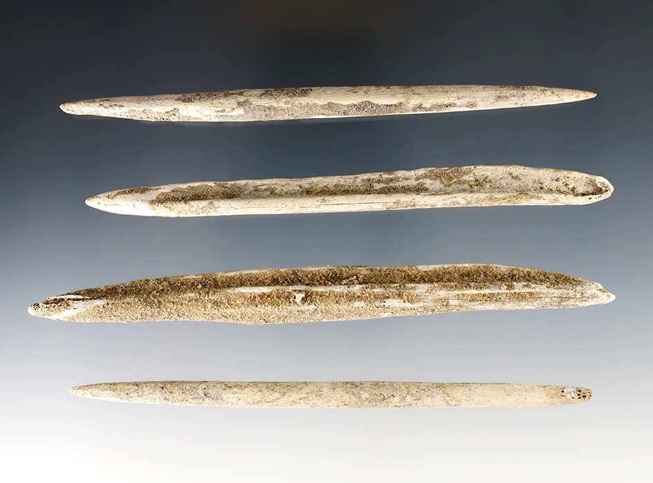 Set of four heavily patinated bone projectile points found in Florida. Largest is 5 1/8".